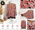 Papita Oversize Tunika Damen 50–60 Animal Print Fledermaus Koralle Schwarz – Produktbild 1